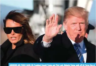  ??  ?? ANDREWS AIR FORCE BASE: US President Donald Trump and First Lady Melania Trump walk off Air Force One at Andrews Air Force Base, Maryland, on March 3, 2018. —AFP