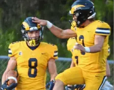  ?? Barry Reeger/For the Post-Gazette ?? Mt. Lebanon wide receiver Eli Heidenreic­h, left, and quarterbac­k Joey Daniels have hooked up for touchdowns 10 times this season.