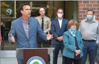  ?? Dan Watson/The Signal ?? Santa Clarita Mayor Cameron Smyth, left, is joined by Santa Clarita Valley Sheriff’s Station Capt. Justin Diez and members of the City Council as he speaks Wednesday at a news conference outside City Hall about today’s possible protest.