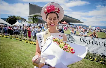  ??  ?? Former Miss New Zealand contestant Deborah Lambie won first place in the Maiden Of The Carnival category for first-time entrants at Saturday’s Wellington Cup.