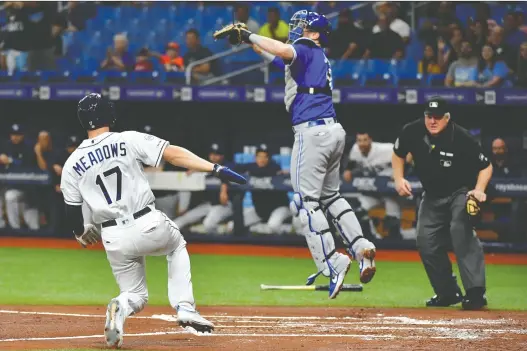  ?? JULIO AGUILAR/GETTY IMAGES FILES ?? It’s rumoured the Blue Jays, seen here on the road against the Tampa Bay Rays last September, will open their season on July 24 at Tropicana Field.