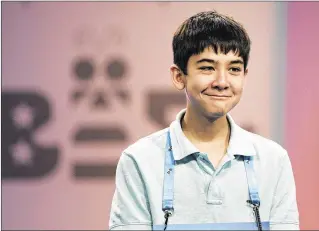  ?? CLIFF OWEN / ASSOCIATED PRESS ?? Tyler Berndt, an eighth-grader from All Saints Catholic School in Jupiter, spells his word correctly Wednesday at the Scripps National Spelling Bee in Washington, D.C. He correctly spelled “affogato” in Round 2 and “ruction” in Round 3. The spelling...