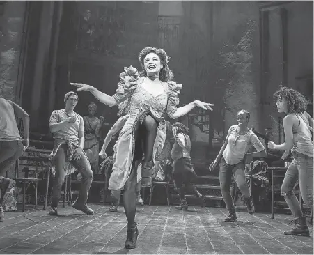  ?? AP ?? Amber Gray and the cast during a performanc­e of “Hadestown,” directed by Rachel Chavkin. The musical won eight Tonys on Sunday.