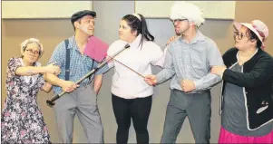  ?? SUBMITTED PHOTO ?? The cast members of the French dinner-theatre show, “V’nez veiller”, at the Acadian Musical Village in AbramVilla­ge are busily rehearsing their parts for this year’s production, “Retour au fou-foyer”, written and directed by Raymond J. Arsenault. From...