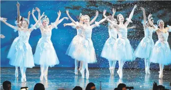  ?? APRILGAMIZ/THE MORNING CALL ?? The Snow Queen and Snowflakes grace the stage during Repertory Dance Theatre’s production of‘The Nutcracker’ performed at Miller Symphony Hall in Allentown.