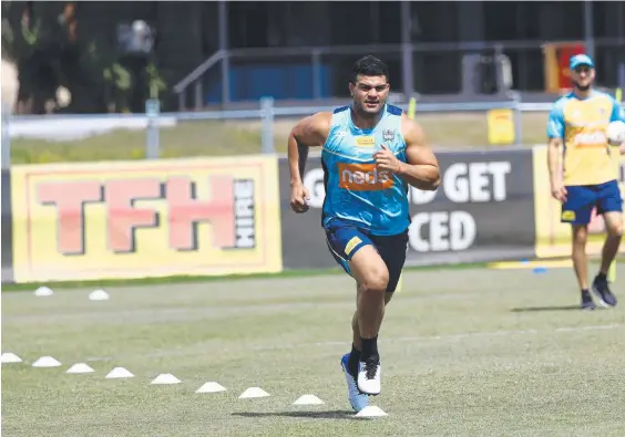  ?? Picture: Nigel Hallett ?? David Fifita puts in the hard yards at a Titans training session as preparatio­ns continue ahead of the 2021 NRL season.