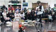  ?? PHOTO: DANIEL BIRCHFIELD ?? Boiling point . . . Ashyr Lane (10), of Christchur­ch, races his teapot ‘‘Wings of Fire’’ during teapot racing, part of the Steampunk NZ Festival, at the Oamaru Club on Saturday.