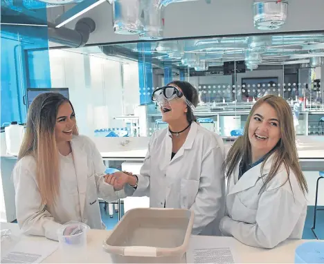  ??  ?? DUNDEE school pupils visited Abertay University as part of a mentoring scheme.
About 40 youngsters from Grove Academy and Morgan Academy were on campus for the project, which saw them carry out experiment­s in the new £3.5 million science labs...