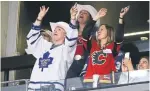  ?? RICHARD LAUTENS TORONTO STAR ?? These fans at Scotiabank Arena were split on which team to support, but not on their choice of headwear.