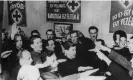  ?? ?? Hungarian fascists saluting at a party meeting circa 1942. Photograph: Keystone/ Getty Images