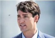  ?? DARRYL DYCK / THE CANADIAN PRESS ?? Prime Minister Justin Trudeau in Surrey on Tuesday when he said the government considers the Trans Mountain project to be in the national interest.