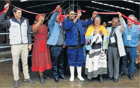  ??  ?? Eastern Cape Rural Developmen­t and Agrarian Reform MEC, Mlibo Qoboshiyan­e leads the official opening of the Wittekleib­osch Dairy Trust's brand new dairy facility.