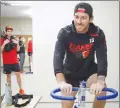 ?? Canadian Press photo ?? Calgary Flames' James Neal rides an exercise bike during fitness testing prior to training camp in Calgary on Wednesday. Calgary Flames captain Mark Giordano intends to pick the brain of newcomer James Neal at various points in the upcoming NHL season.