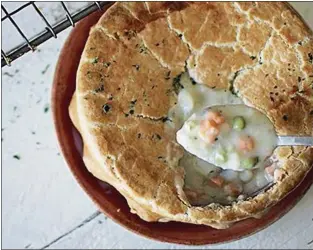  ?? COURTESY OF LAZY DOG ?? At Lazy Dog restaurant­s, one of the signature dishes is Chicken Pot Pie.