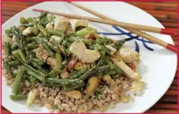  ?? PHOTO BY CURT NORRIS ?? Chicken Tenders and Asparagus Stir-Fry is a dish that requires very little time to cook once the ingredient­s are assembled.