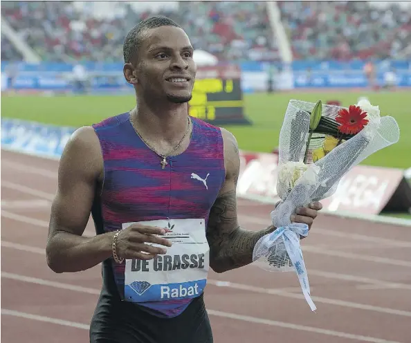  ?? STRINGER/AFP/GETTY IMAGES ?? Canada’s Andre De Grasse won the 200-metre race at the IAAF Diamond League Mohammed VI Athletics meeting in Rabat on July 16 and was looking in top shape heading into the IAAF World Championsh­ips in London, only to suffer a hamstring injury in practice...