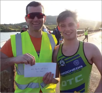  ??  ?? Jack receives first prize for winning the Newry Aqathlon.