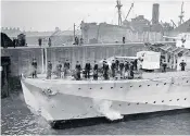  ?? U-93 ?? Left, German Pows disembark from the Hesperus, and right, the ship coming into Falmouth for repairs after ramming