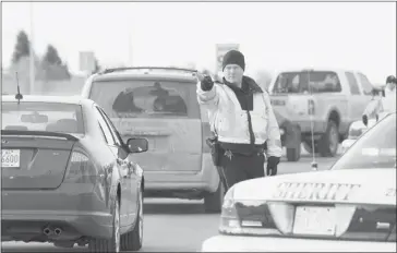  ?? Calgary Herald Archive ?? Bill 26 would allow police officers working alcohol checkstops to impose administra­tive penalties on drivers with a blood-alcohol concentrat­ion of .05, which is below the current .08 required to lay criminal charges.