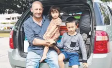  ??  ?? STRUGGLING: Homeless Wayne Davison and his children, Ace, 7, and Emme, 3, have received offers of help. Picture: STEWART McLEAN