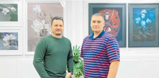  ?? ?? Award-winning Hawke’s Bay photograph­ers Richard Wood and Chris Helliwell have opened an art gallery in Napier.