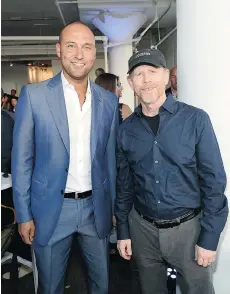  ?? JAMIE McCARTHY/GETTY IMAGES FOR THE PLAYERS’ TRIBUNE ?? Derek Jeter, seen with director Ron Howard at a Player’s Tribune party in New York on Aug. 24, 2015, founded the website after retiring from baseball in 2014 after 20 seasons with the New York Yankees.