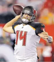  ?? CHRIS O’MEARA/ASSOCIATED PRESS ?? Tampa Bay quarterbac­k Ryan Fitzpatric­k leads the NFL with 1,230 yards passing and looks like he’s keeping the job, even with Jameis Winston returning.