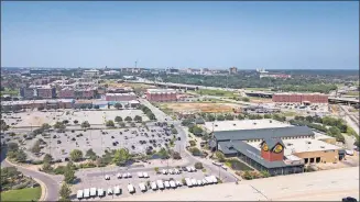 ?? [DAVE MORRIS/THE OKLAHOMAN] ?? The cleared 4.8-acre lot located north of Bass Pro Shops and south of the recently opened Springhill Suites is for sale following cancellati­on of three hotels planned for the property, including a Canopy by Hilton.
