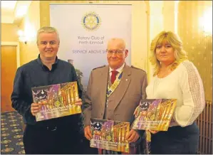  ??  ?? Two local charities received donations from the Rotary Club of Perth Kinnoull, from money raised by the sale of the club’s 2014 charity calendar. Club president Peter MacDougall presented cheques for £4,000 each to Raymond Jamieson, PKAVS Young Carers...