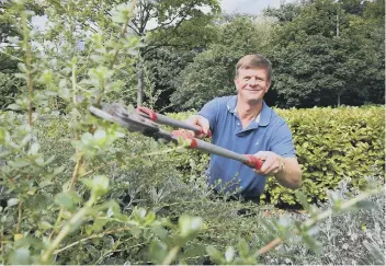  ??  ?? Gardener Ian Baillie.
