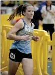  ?? Photo courtesy of JBU Sports Informatio­n ?? Junior Sarah Larson runs the indoor 5K at the Missouri Southern State Lion Invite held in Joplin, Mo., in early February.