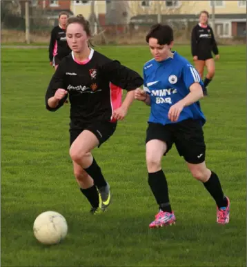  ??  ?? Chloe Waters of Seaview United and Marian Cardiff of Courtown Hibs in action during a recent game at Riverchape­l Community Complex.