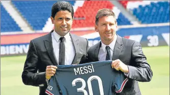  ?? AFP ?? Paris Saint-germain President Nasser Al-khelaifi (L) with Argentinia­n football player Lionel Messi in Paris on Wednesday.