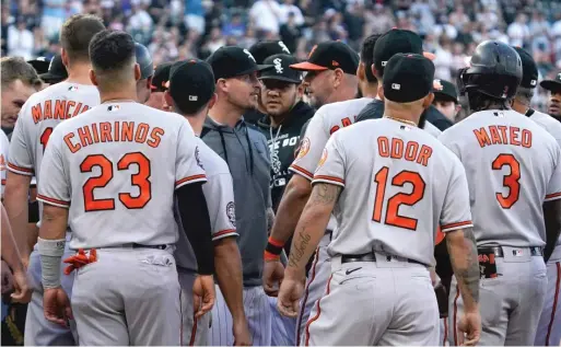  ?? NAM Y. HUH/AP ?? Sox and Orioles players have a standoff in the second inning Friday night after Sox starter Michael Kopech hit Jorge Mateo with a pitch, causing the benches to clear.