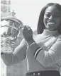  ?? ANGELA WEISS/ GETTY IMAGES ?? Sloane Stephens poses with her U.S. Open trophy in Central Park in New York on Sunday.