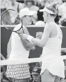  ?? BEN CURTIS THE ASSOCIATED PRESS ?? Alison Riske, right, eliminated No. 1 seed Ashleigh Barty at Wimbledon on Monday.