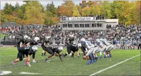  ?? CATHERINE AVALONE — NEW HAVEN REGISTER ?? The Falcons play West Haven during their first football game on the newly dedicated, Larry McHugh Field Saturday afternoon. Xavier won 27-7.