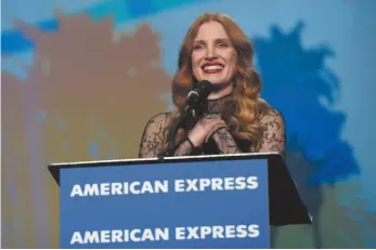  ?? PHOTO BY CHRIS PIZZELLO/INVISION/AP ?? Jessica Chastain accepts the chairman’s award for Molly’s Game at the 29th annual Palm Springs Internatio­nal Film Festival on Tuesday in Palm Springs, Calif.