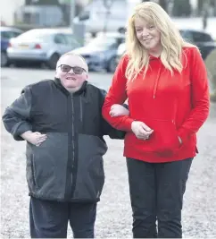  ??  ?? Active life: Caroline Wheeler and son Lee outside their home. Left: Declan McMullan who has Locked-In-Syndrome