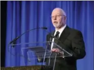  ?? JOHN MINCHILLO — THE ASSOCIATED PRESS ?? In this file photos, Paul Singer, founder and CEO of hedge fund Elliott Management Corporatio­n, is shown speaking at the Manhattan Institute for Policy Research Alexander Hamilton Award Dinner, in New York.