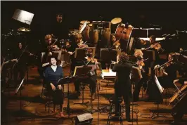  ?? ?? Bullock (left) performed with her husband and collaborat­or, conductor Christian Reif, and members of the S.F. Symphony.