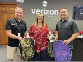  ?? SUBMITTED PHOTOS ?? From left, Matt Smith, owner RadioActiv­e Electronic­s; Heather Giel, Berkshire High School assistant principal; and Todd Taylor, TCC Verizon representa­tive in Middlefiel­d.