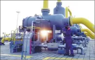  ?? CHEN YEHUA / XINHUA ?? A technician inspects a terminal at the China-Kazakhstan gas pipeline in Horgos, the Xinjiang Uygur autonomous region.