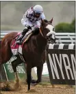  ?? SETH WENIG — THE ASSOCIATED PRESS ?? Tiz the Law (8), with jockey Manny Franco up, crosses the finish line to win the152nd running of the Belmont Stakes horse race, Saturday, June 20, 2020, in Elmont, N.Y.