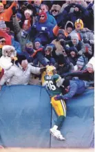  ?? PACKER PLUS FILES ?? LeRoy Butler's first “Lambeau Leap” was on a frigid day on Dec. 26, 1993, against the Los Angeles Raiders.