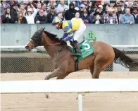  ?? Submittted photo ?? ■ Yuugiri, under Ricardo Santana Jr., wins the $150,000 Carousel Stakes Saturday at Oaklawn. Photo courtesy of Coady Photograph­y.