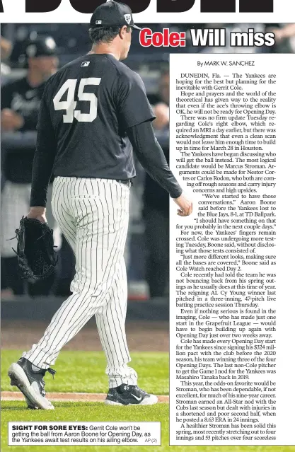  ?? AP (2) ?? SIGHT FOR SORE EYES: Gerrit Cole won’t be getting the ball from Aaron Boone for Opening Day, as the Yankees await test results on his ailing elbow.