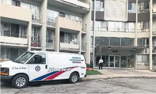  ?? TAMARA LUSH/THE ASSOCIATED PRESS ?? A police forensics team examine the Thorncliff­e Park apartment where Faisal Hussain lived.