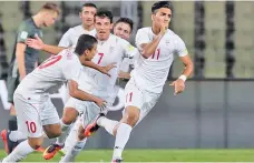  ??  ?? GETTY IMAGES Younes Delfi (R) celebrates scoring Iran’s first goal with teammates in the 4-0 thrashing of Germany at the FIFA U-17 World Cup 2017 in Goa, India, on October 10, 2017.