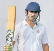  ?? AP ?? ■ Gautam Gambhir raises bat after completing his fifty on Friday.